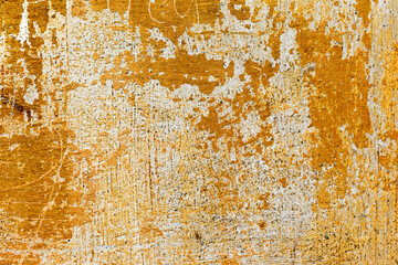 Creative background beautiful concrete casually painted yellow paint, cracks and scratches. Grungy concrete surface. Great background or texture for your project.