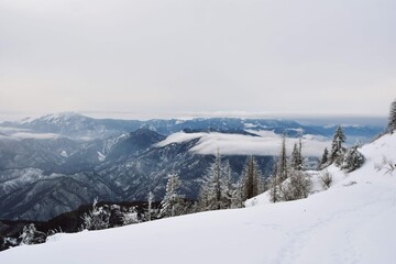 snowy mountain with beautiful clouds at high altitude 