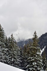 snowy mountain with beautiful clouds at high altitude 