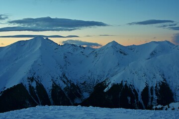 snowy mountain with beautiful clouds at high altitude 