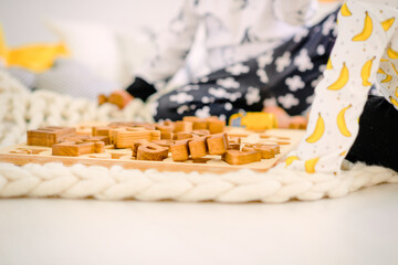 Children playing with blocks. Close-up.