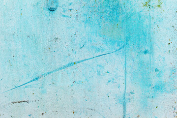 Abstract background concrete painted with blue paint, weathered with cracks and scratches. Landscape style. Grungy Concrete Surface. Great background or texture.