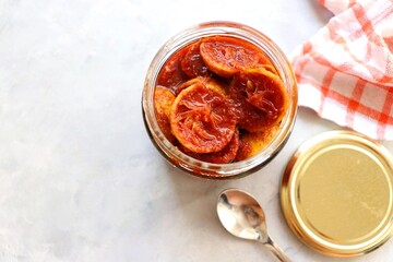 Indian traditional homemade sweet, tangy and spicy lemon pickle or limbu che lonche. also known as...