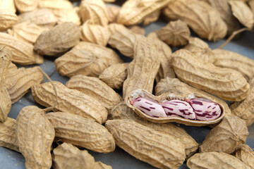 peanuts in shell. Close up raw peanuts, boil nut with copy space.