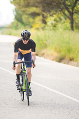 Fototapeta na wymiar Professional road bike rider in action