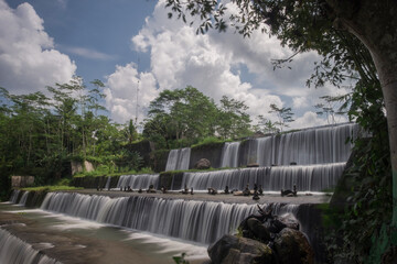 (Grojogan Watu Purbo) Watu Purbo waterfall is a multi-storey river dam and is one of the tourist destinations in Sleman, Yogyakarta.