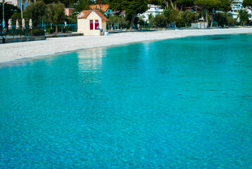 Photo of the beautiful Mondello beach, turquoise sea and white sand.