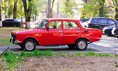 old red car in the street