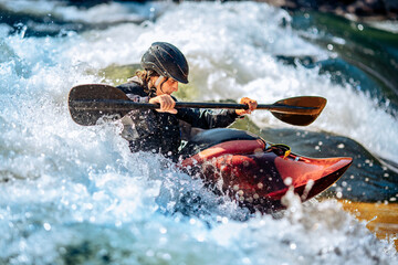 Banner whitewater kayaking, extreme sport rafting. Guy in kayak sails mountain river - obrazy, fototapety, plakaty