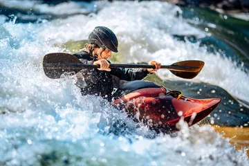 Schilderijen op glas Banner whitewater kayaking, extreme sport rafting. Guy in kayak sails mountain river © Parilov