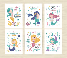 Set of posters with mermaids, starfish, seaweed and coral