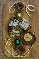 Christmas pastries with poppy seeds sprinkled with colored pieces of green chocolate