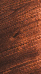 dettaglio di tavolo in legno colore ciliegio