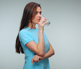 Woman drink water from glass. isolated