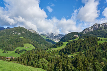 Landscape panorama of green nature  of Swiss Alps near town Gruyere (Gruyères), Fribourg canton of Switzerland