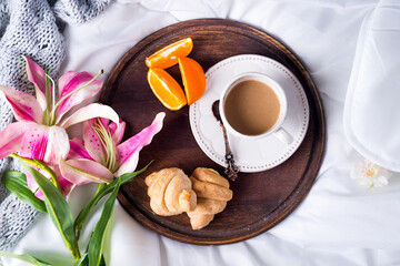 Pink lilies and coffee cup