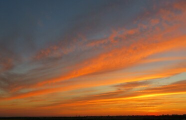 Beautiful fiery orange sunset over the city, natural background