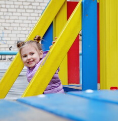Fototapeta na wymiar little girl on playground