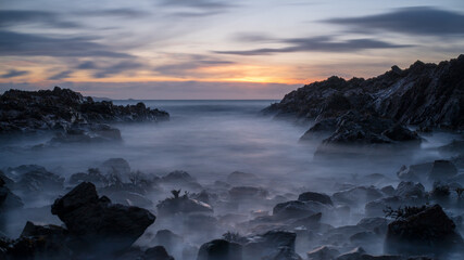 Moody sunrise over the sea in Guernsey