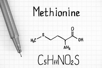 Chemical formula of Methionine with pen.