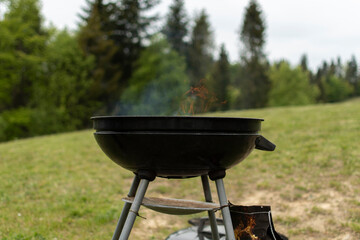Grill with fire in nature
