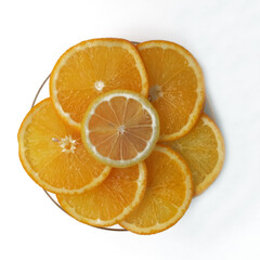 Lemon and orange slices on white background. Sliced fruit isolated. Healthy food concept.