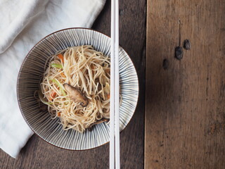 Top view stir fried noodle in vegetarian style