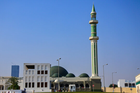 Al Shouyoukh Mosque with green minarets and domes located in Doha the capital of Qatar