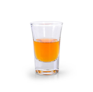 Glasses of whiskey and alcohol isolated over white