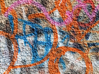 Landscape style. Grungy concrete surface with cracks, scratches traces of different colors paint on...