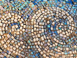 Old diagonal colorful mosaic texture on the wall