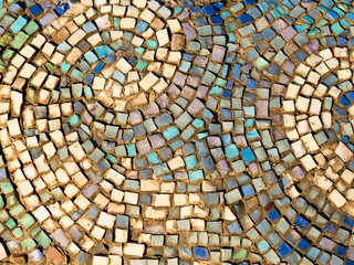 Diagonal colorful mosaic texture on the wall