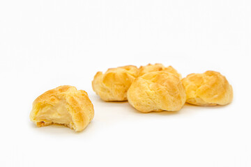 Eclairs on white background. eclairs with cream.