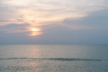 Sunset beautiful golden yellow. Beach, sea, sandy beach. On twilight.