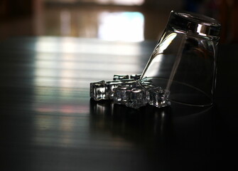 whiskey glass upside down on ice cubes,don;t drunk concept.