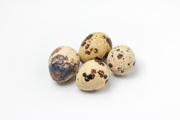 Fototapeta premium Quail eggs isolated on a white background