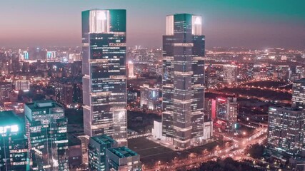 Aerial photo of the twin towers at night in Zhengzhou Green Space Center, Henan Province