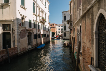 Fototapeta na wymiar Boats on the canal of Venice, Italy.