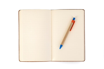 an empty notebook and pencil on the white background