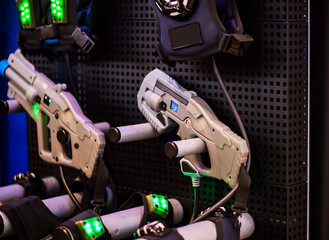 laser tag gun and armor. A variety of weapons for playing laser tag. close up on military equipment on laser tag game