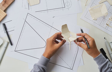 Designer sketching drawing design development product plan draft chair armchair Wingback Interior...