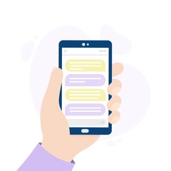 Smartphone with a messaging app. Hand holding a phone. Person chatting through an online application.