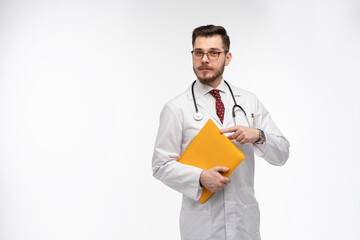 A portrait of a medical doctor posing against white background