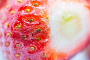 Fresh juicy strawberries closeup. Macro photo of a berry