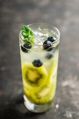 Blueberry cocktail with kiwi fruit. Selective focus. Shallow depth of field.
