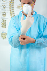 Doctor Wearing White Latex Gloves to prevent covid19 coronavirus spreading