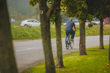 Man on commute with a bicycle