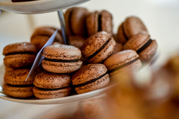 Close up of a plate with chocolate macaroons
