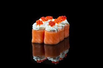 Sushi Roll On A Black Background reflection . Japanese food. Close Up.