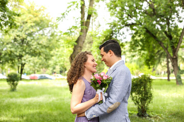 Bridal couple posing in the park